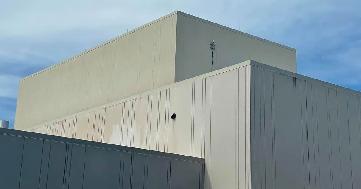 After: A commercial building before and after exterior pressure washing