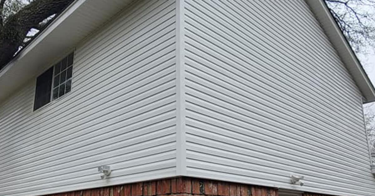 After: A house exterior before and after a chemical soft wash