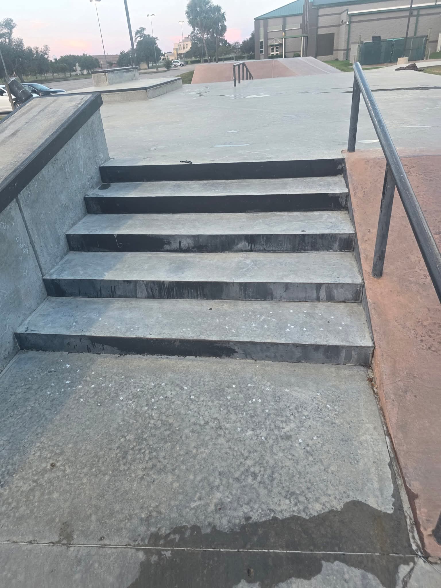 After: A commercial building exterior before and after pressure washing