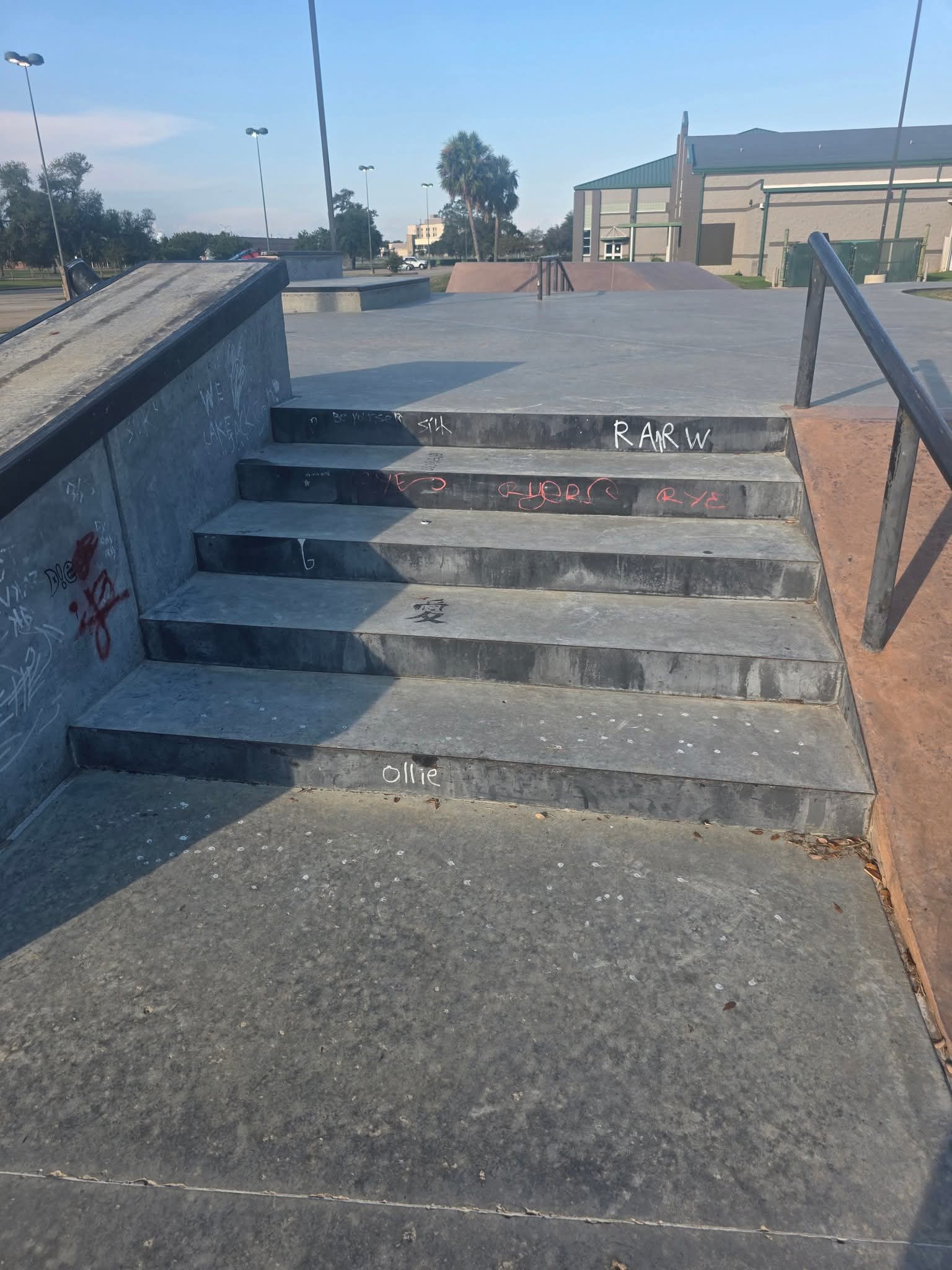 Before: A commercial building exterior before and after pressure washing