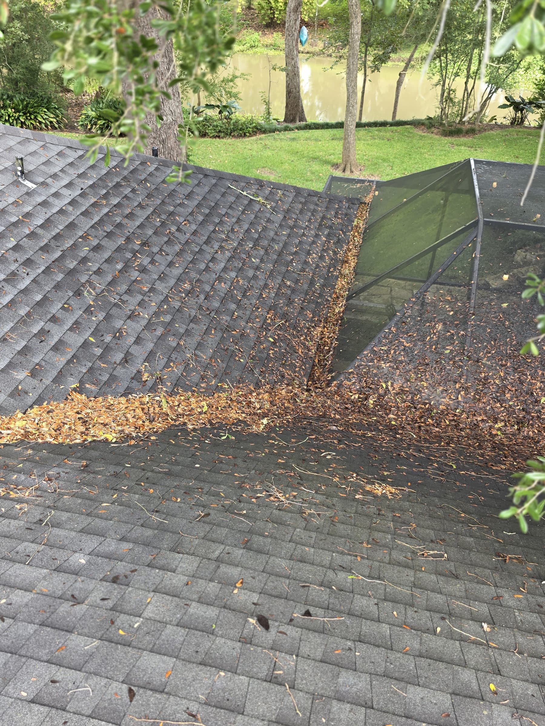 Before: A gutter run before and after cleaning and brightening, with the black tiger stripes removed